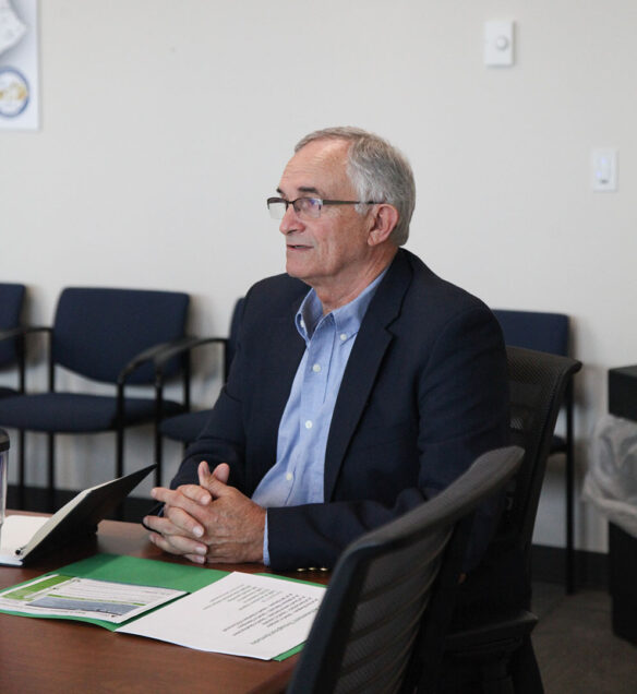 A man sitting at a table. 