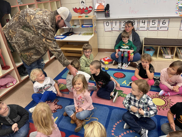 Carlisle County preschool students sitting on a carpet. 