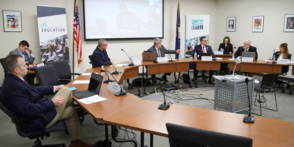 A picture of superintendents sitting around tables in a semicircle during the Local Superintendents Advisory Council meeting at KDE.