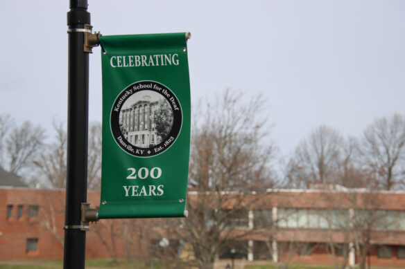 A sign reads "Celebrating 200 years" with the Kentucky School for the Deaf logo