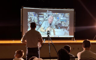 Middlesboro community members, including educators, students, parents, elected officials and others, gathered for a live video call with Astronaut John Shoffner on May 26 at Middlesboro Independent's Central Arts Auditorium.