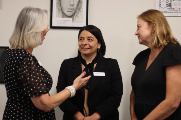 Two current members of the Kentucky Board of Education, Patrice McCreary and Holly Bloodworth, talk withs 2023 Kentucky Teacher of the Year Mandy Perez.