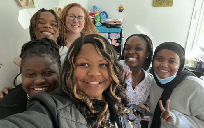 People smiling for a selfie