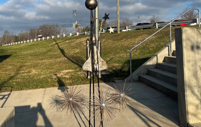 A sculpture of a space rocket