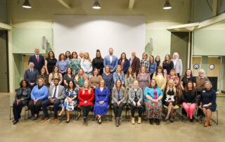 Group of 83 teachers posing