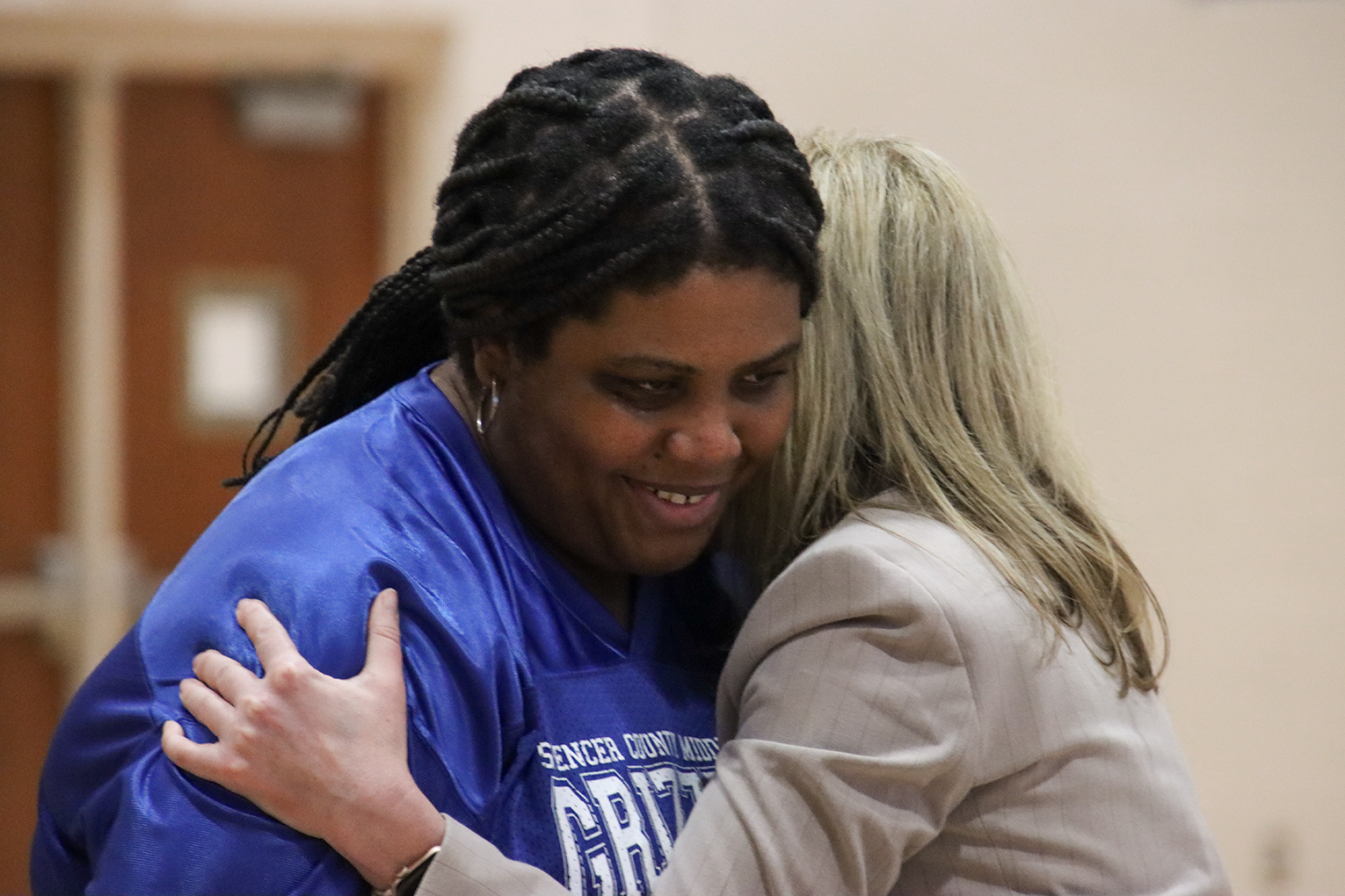 Kala Marshall hugs Erin Demyan.