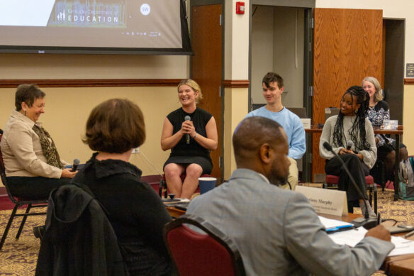 From left to right, Kentucky High School Transformation Work Group Member Lu S. Young shares a laugh with Elkhorn Crossing School students Cathrynn “Cat” Hager, Titus Smith and Maya Felton during the work group’s discussion on the school’s programs.