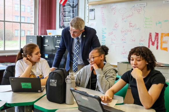 Highland Middle School 7th-grade consumer science students, from left, Natalie Martinez, Brooklyn Wright and Peyton Dietrich talk to Commissioner of Education Robbie Fletcher about what they learned. 