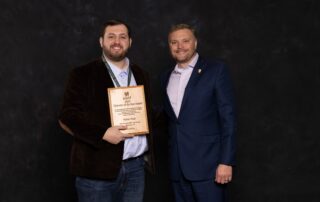 Peyton Pugh, left, a science teacher at Rockcastle County Middle School, earned the