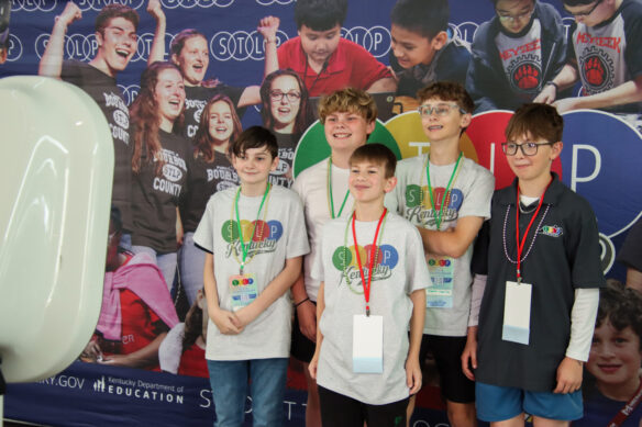 A group of students pose for a photo